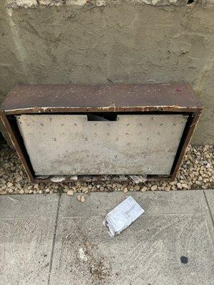 Mailbox that needed to be repaired a decade ago, finally fell off the wall