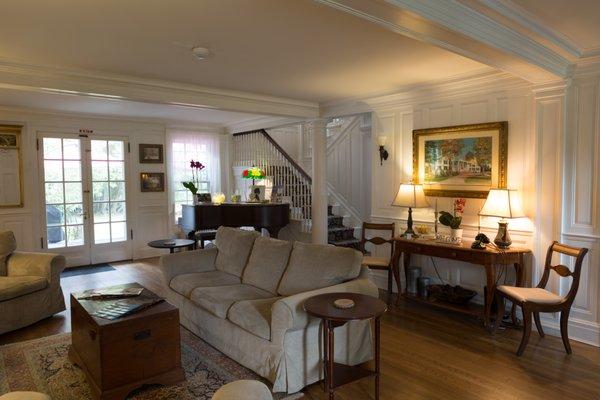 The living room in the Main House of the Inn at Stockbridge welcomes guests to their Berkshires vacation.