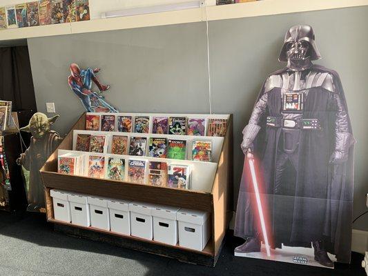 Featured comic display and standees of various characters