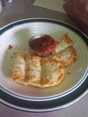 Cheesy bread and marinara sauce. The dipping sauce is really good.