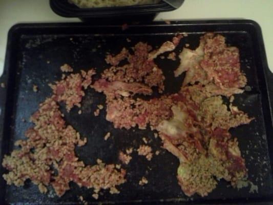 This is the toppings off of two pieces of pizza!! Theres enough here for 2 more whole pizzas!!! YUCK!!!