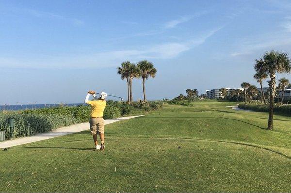 Chris hitting a shot on a par 3