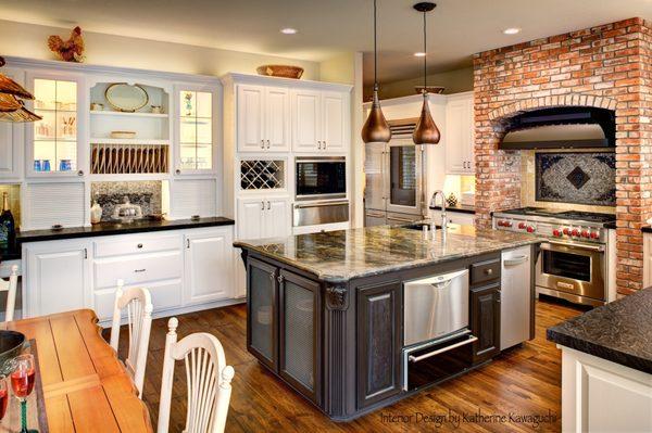 Beautiful addition to the ugly pink tiled island! Added new finish on cabinets, new hardwood flooring, new appliances, cabinet refinsih, etc