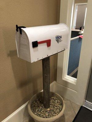 Wednesday, May 22, 2019: mailbox by door.