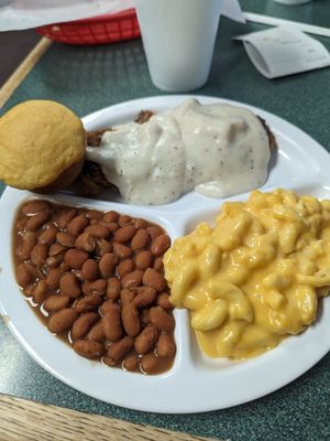 Country fried steak, pinto beans, Mac and cheese, and cornbread