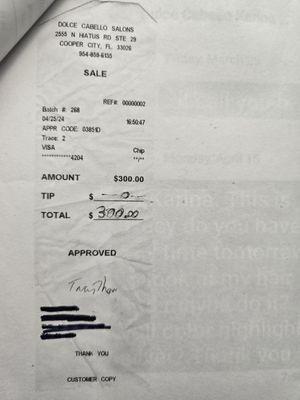 Credit card receipt of hair service received from Dolce Cabello