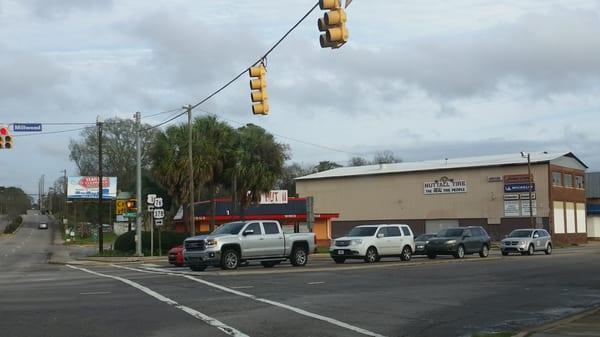 The restaurant is at a very busy intersection.