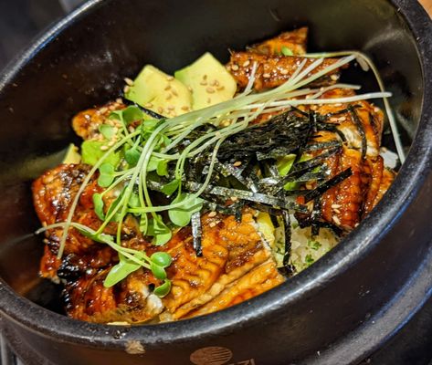 February 2022 - Part of my guest's lunch special. Grilled eel over rice. Rice too vinegary.