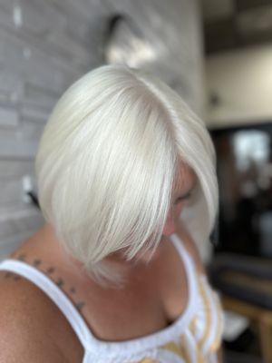 Platinum retouch and bob haircut.