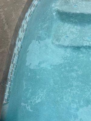 Glass tiles and resurfaced pool