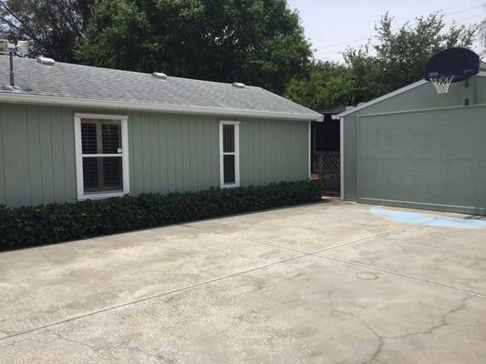 P.C. House and concrete pad.