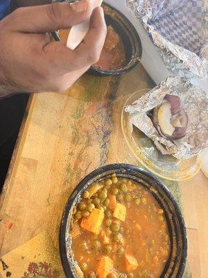 Top: goat curry, chili and onion salad.  Bottom: Paneer muttar