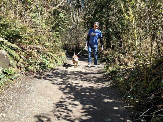 Dad and pup tackling the trails.