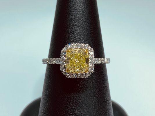 Yellow diamond halo engagement ring