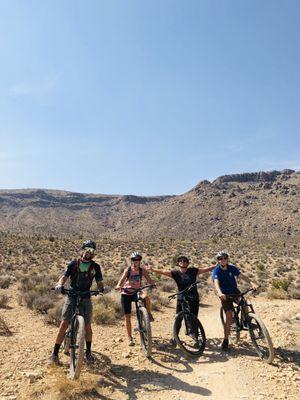 Tour guide & 3 of the riders. Spring mountain in the background.