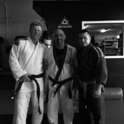 Blue belt ceremony at Bjj academy.  Legendary blue belt, Ashley Starling is flanked by non other than Rodrigo Gracie