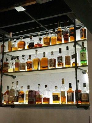 Shelf of booze.