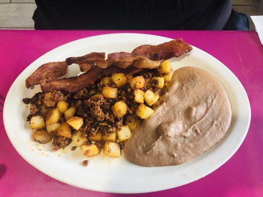 Papas with chorizo, bacon, and beans.