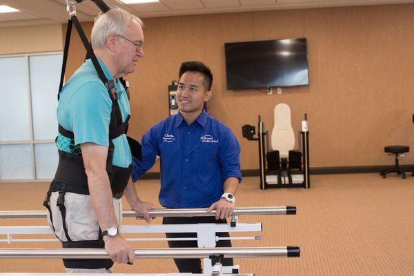 State-of-the-art therapy gym with a ceiling lift track system to help non-weight bearing guests with recovery.