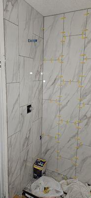 Process of installing tile in shower stall