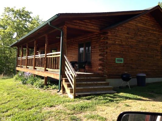 Our Meadow cabin sleeps 4.  Relax on the huge front porch!