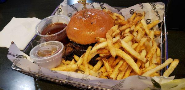 Sliced brisket sandwich ($17) comes with BBQ sauce and fries