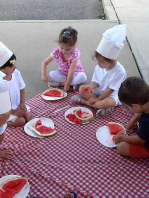 Summer Program 2014 - Fantastic Food - Students explore and taste watermelon.