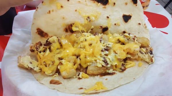 Bacon, egg, potato, and cheese taco