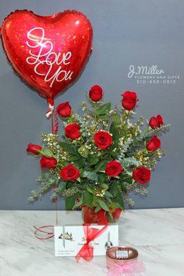 "I Love You" the complete gift set: 1 dozen Red Roses, Mylar balloon, box of chocolates, and Voluspa candle.