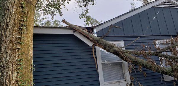 Clearly - still on the roof/house and even though Kevin said he'd have someone come back - it is still there.