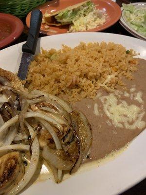 Pechuga Frita and beef taco