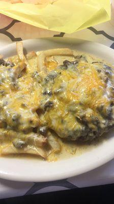 Emma's Special. Hamburger & Fries smothered in green chile.