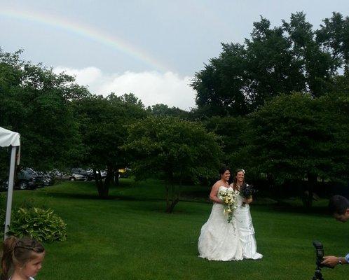 A Simple Ceremony celebrates all weddings. A real rainbow showed up for these two brides in 2013.