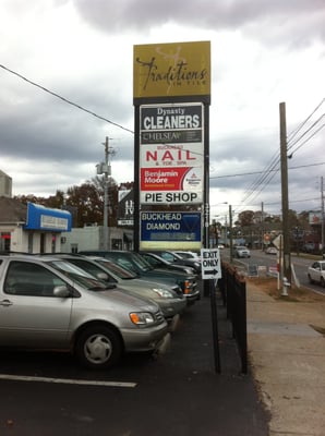 Look for our red Benjamin Moore sign our in front of our building.