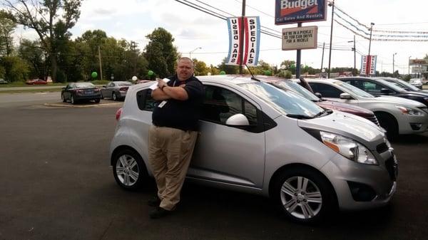 Me with my family's new car!