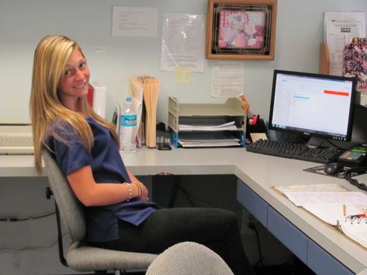 Receptionist will greet you with a smile when you walk into Exclusively Cats!