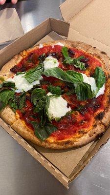 Margarita Pizza with Burrata, Crispy Prosciutto and olives