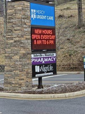 Roadside Sign.  Note Hours are for Mercy Urgent Care