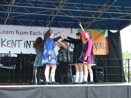 Miss Lyndsey counting the little girls on stage