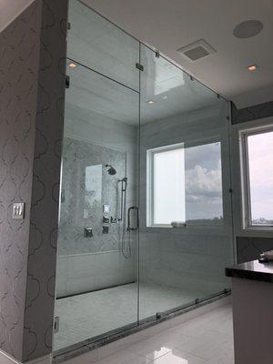 OVER SIZED STEAM SHOWER ENCLOSURE INSTALLED WITH 1/2" GLASS.