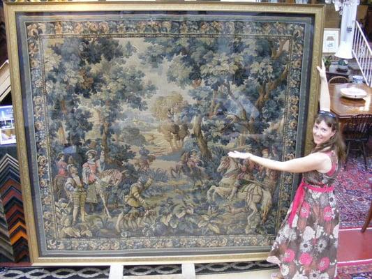 After a grueling stitch session the tapestry is ready and Owner\operator Stephanie McFarland is obviously pleased.