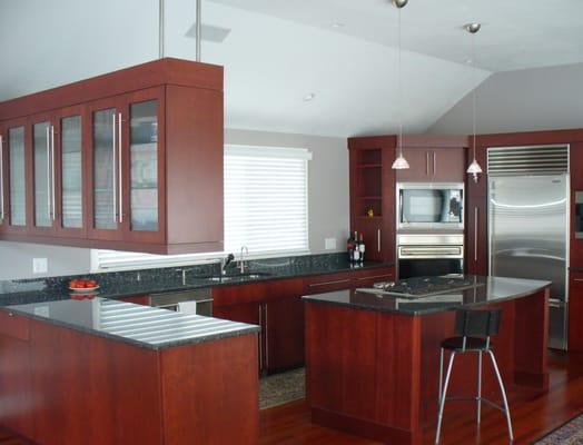 Dark stained Cherry Kitchen w/Stainless steel appliances