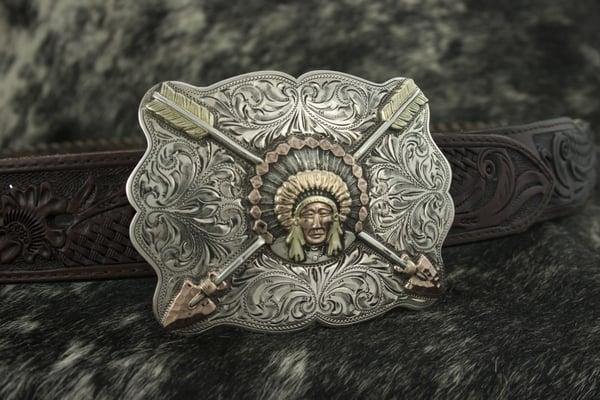 Fine Silver cowboy belt buckles and custom hand-tooled leather belt