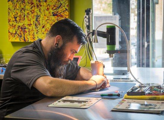 Josh repairing a iPhone 6 Plus