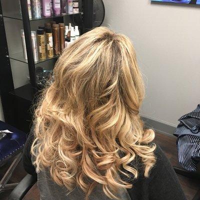 Clients hair after installing her beautiful hair extensions.