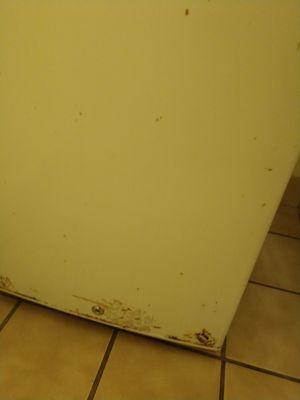 Old rusty refrigerator