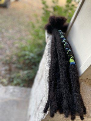 100% human hair freeform custom made dreadlock extensions, with colorful yarn design.