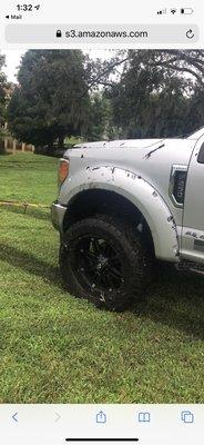 Pulling truck out of mud.