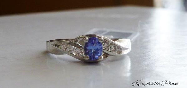 Oval Tanzanite Diamond Accent Bypass White Gold Ring