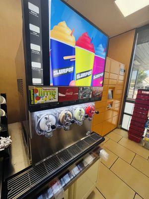 All four flavors at the Slurpee machine are ready to be served. Incredible.